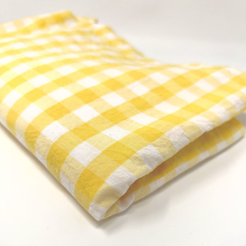 lovely checkered yellow and white fabric 
