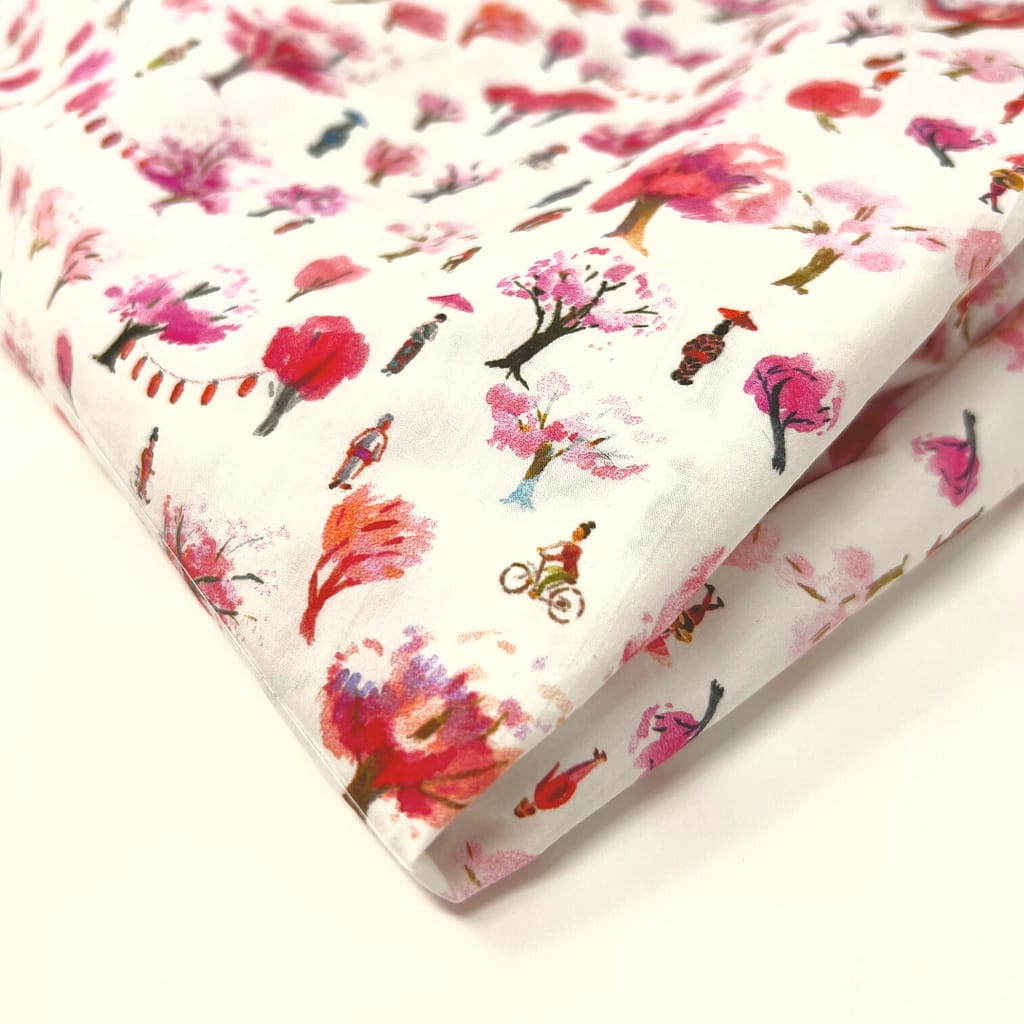 This lightweight fabric features pinkish gardens