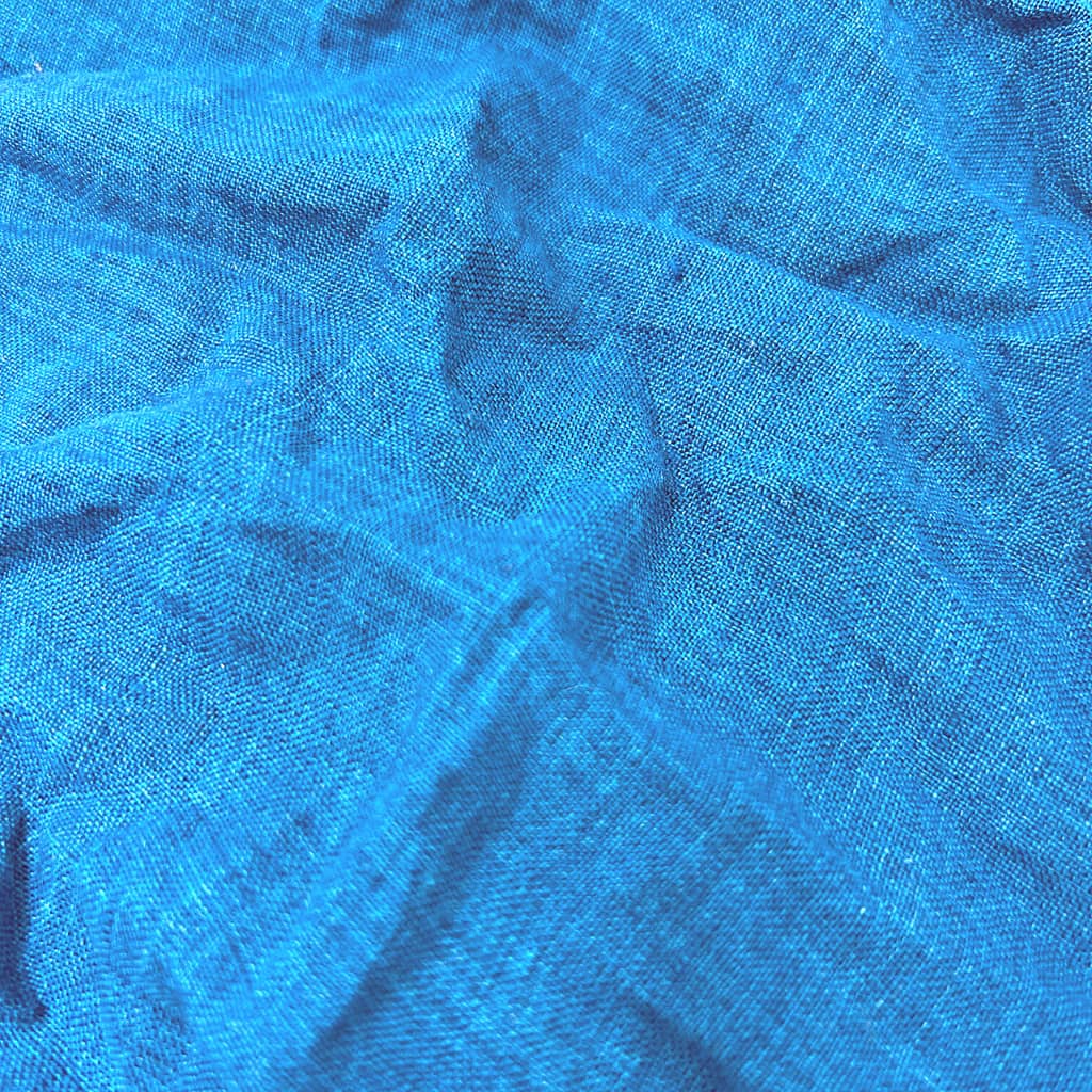 This supple, lightweight Italian linen boasts a deep blue hue