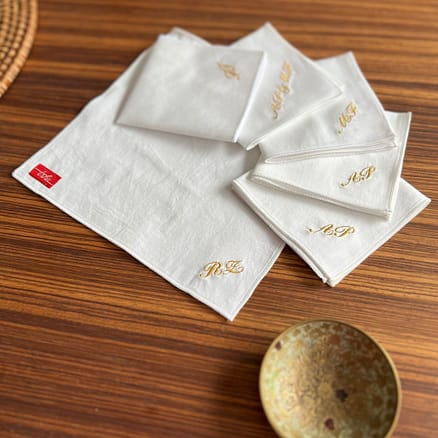 white handkerchiefs with gold monogram